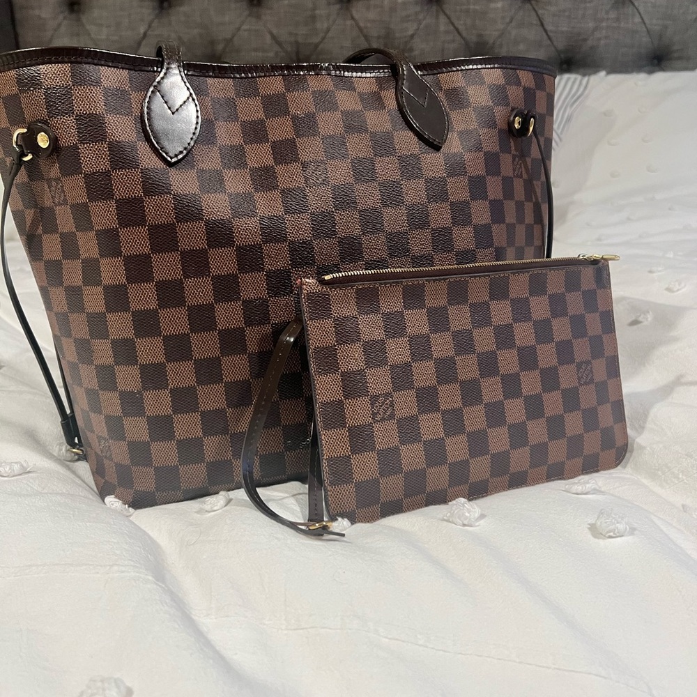 Louis Vuitton neverfull MM (2015 version) currently selling for $2030 on site
